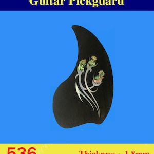 May include: Black guitar pickguard with a floral design in abalone shell. The pickguard is shaped like a teardrop and has a thickness of 1.8 mm. The pickguard is labeled with the number 536.