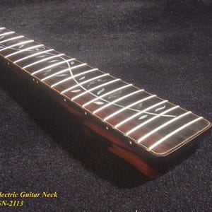 May include: A close-up shot of a guitar neck featuring white frets and decorative inlays. The neck is crafted from dark wood with a reddish-brown tone. The text "Bruce Wei Electric Guitar Neck GN-2113" is visible.