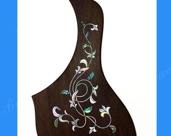 May include: A dark brown guitar pickguard with a floral design. The pickguard is made of rosewood and has an inlaid mother-of-pearl floral pattern. The text "Guitar Rosewood Pickguard fit Taylor" is visible.