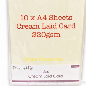 May include: A pack of 10 sheets of A4 cream laid card, 220gsm, from Dovecraft. The pack is labelled "Tylers Trinket Box".