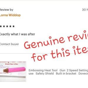 May include: A pink embossing heat tool with a black tip and a black handle. The tool is in a clear plastic box with the words "Brand New in Box" printed on it. The tool has two speed settings and a safety shield. The text "Embossing Heat Tool Gun 2 Speed Settings Easy use Safety Shield Built in bracket Dovecraft Pr..." is visible below the image.