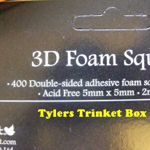 May include: A pack of 400 double-sided adhesive foam squares. The squares are acid free and measure 5mm x 5mm with a thickness of 2mm. The pack is labelled "3D Foam Squares" and "Tylers Trinket Box".