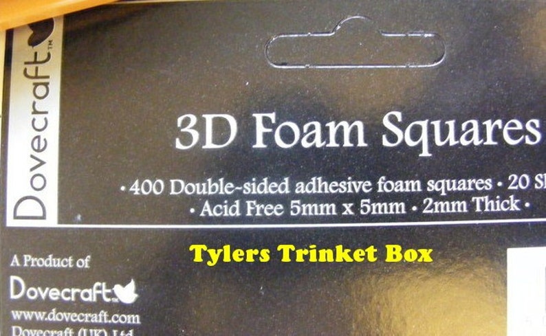 May include: A pack of 400 double-sided adhesive foam squares. The squares are acid free and measure 5mm x 5mm with a thickness of 2mm. The pack is labelled "3D Foam Squares" and "Tylers Trinket Box".