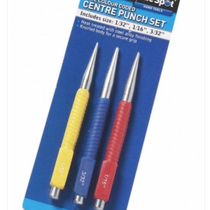 May include: A set of three colour-coded centre punches in blue and white packaging. The punches are yellow, blue, and red and are labelled with their sizes: 1/32", 1/16", and 3/32". The packaging also includes the text "Blue Spot Hand Tools" and "3PCE Colour Coded Centre Punch Set".