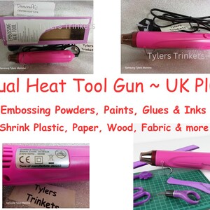 May include: Pink dual heat tool gun with a UK plug. The tool is labeled "Embossing Heat Tool" and is used for embossing powders, paints, glues, inks, shrink plastic, paper, wood, fabric, and more.