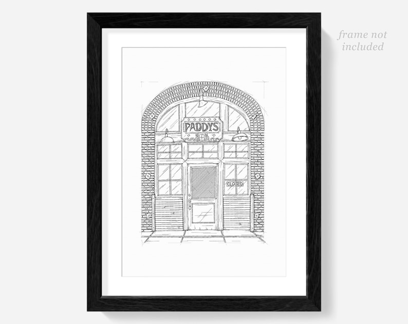 May include: Black and white line drawing of a brick building with an arched doorway. The building has a sign that reads "Paddy's Pub".