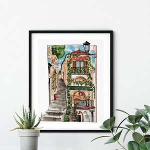 May include: Watercolor painting of a narrow street in a European city. The street is lined with buildings, and there are stairs leading up to a building with a balcony. The building has a green awning with the word "Ristorante" written on it. There is a street lamp on the right side of the image.