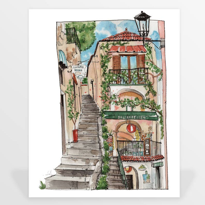May include: A watercolor painting of a narrow, cobblestone street in a European city. The street is lined with buildings, and there are stairs leading up to a building with a green awning that says "Delikatessen".