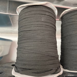 In STOCK 1/4 inch black braided elastic,  elastic for masks, black elastic, notions, swim elastic, skinny elastic, rubber elastic, scratches