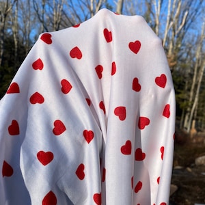 Red on white hearts Valentine’s Day apparel fabric, red heart stretchy knit fabric, baby apparel fabric, red heart, lightweight fabric