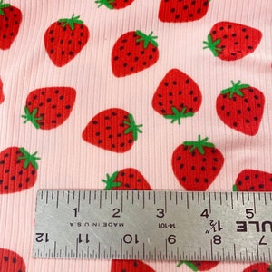 KNIT Red strawberries on light pink ribbed polyester stretchy fabric / rib stretchy knit fabric / polyester stretchy knit fabric