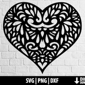 May include: A black and white intricate heart-shaped design with a mandala-like pattern. The design is perfect for crafting, cutting, and creating projects.