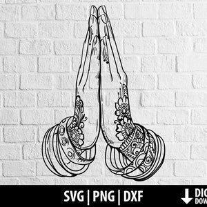 May include: Black and white line art illustration of two hands in a prayer position with intricate floral designs on the wrists and forearms.
