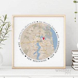 May include: A framed map print with a red heart marking Jacksonville, Florida. The text around the map reads "33'43'31.4"N 84'27'51.8"W The Williams Family 2024 New Home New Beginning New Memories".