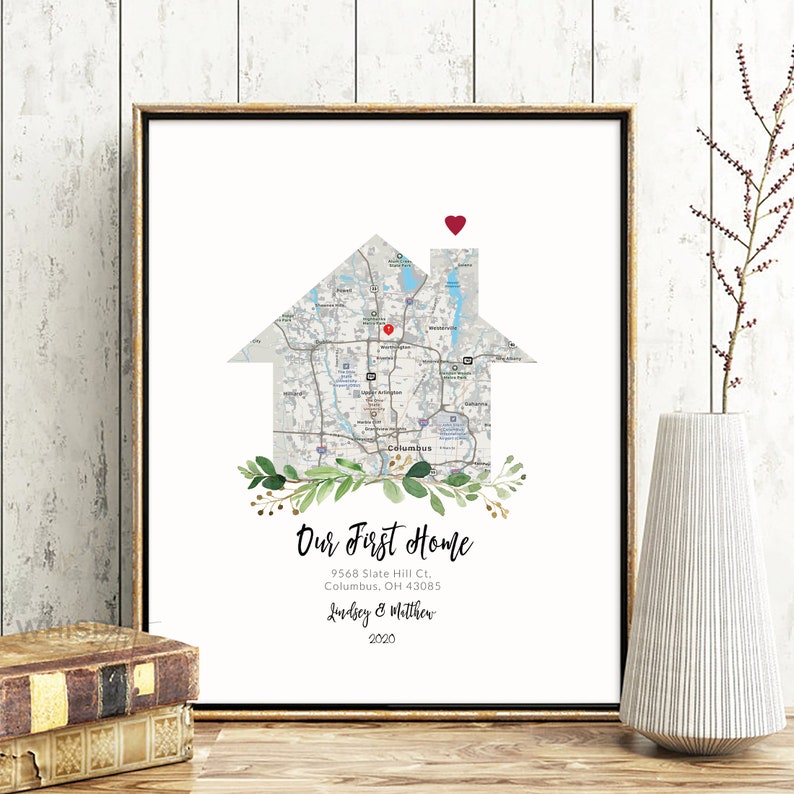 May include: A printable art print featuring a house-shaped map of Columbus, Ohio with a red heart marking the location of 9568 Slate Hill Ct. The text "Our First Home" is below the map, along with the address, "Lindsey & Matthew", and the year "2020".