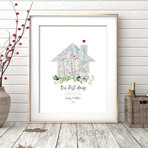 May include: A printable map of a house with a red heart on the chimney. The map is in the shape of a house and includes the text "Our First Home", the address "9568 Slate Hill Ct, Columbus, OH 43085", the names "Lindsey & Matthew", and the year "2020".