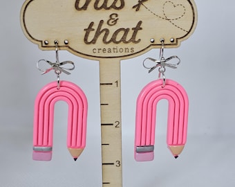pencil arch earrings with bow dangle