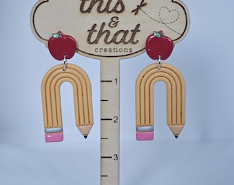 pencil arch earrings with apple dangle