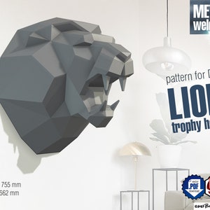 May include: A digital download pattern for a DIY metal lion trophy head. The pattern is for welding and is 7.55 inches tall and 6.62 inches wide. The image shows a 3D model of the lion head.