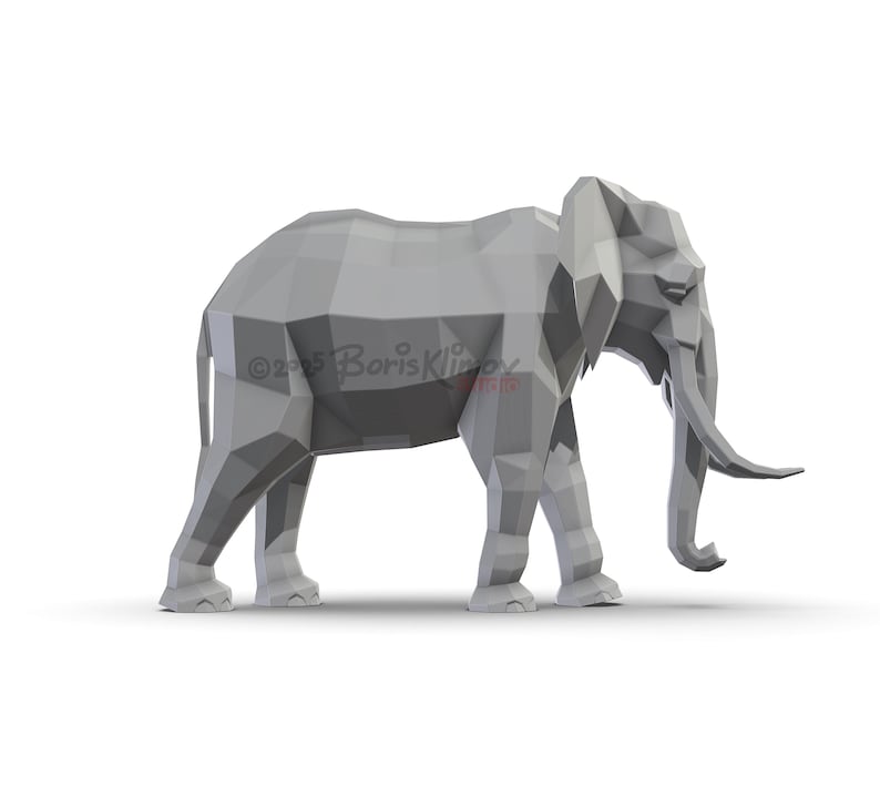 May include: A gray, geometric elephant sculpture with a polygonal design. The elephant has large tusks and is standing on a white surface. The sculpture is a modern take on the classic animal form.