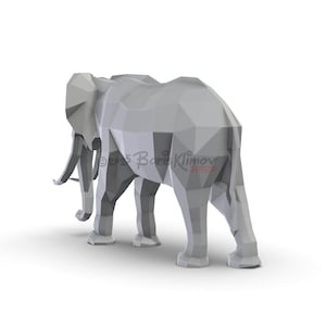 May include: A gray, geometric elephant sculpture, viewed from the rear, stands on a white surface. The sculpture is made of many flat, triangular planes. The artist's name and copyright are visible on the side of the elephant.