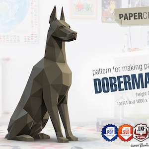 May include: A papercraft model of a Doberman dog in a sitting position. The model is made of brown paper and is 800 mm tall. The image includes the text "pattern for making paper Doberman" and "height 800 mm for A4 and 1000 x 700 mm."