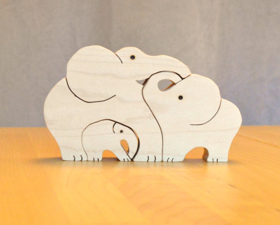 Wooden elephant family puzzle toy | Etsy