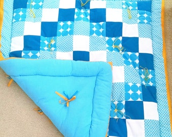 The COZIEST, easy-to-make over-stuffed, tied baby quilts