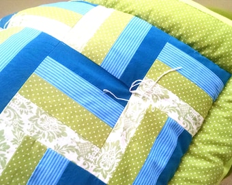 The COZIEST, easy-to-make over-stuffed, tied baby quilts