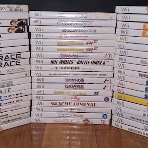 Nintendo Wii Family Fun, Party and Adventure games - Game Party, Resident Evil, Wipeout, Bakugan, Karaoke, Rampage - Disc In Great Cond.