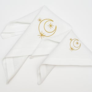 Winter Whispers: Linen White Embroidered Christmas Table Napkins with Festive Designs – The Perfect Gift for a Gracious Hostess
