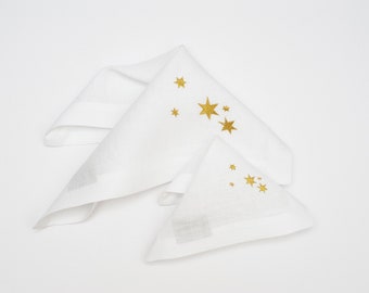 Starry Nights: Linen White Embroidered Christmas Table Napkins with Celestial Elegance