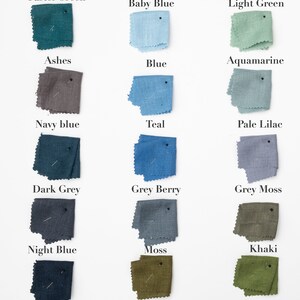 May include: A collection of 18 fabric swatches in various shades of blue, green, gray, and brown. The swatches are arranged in three columns, with each column labeled with a color category. The swatches are all made of a soft, textured fabric.