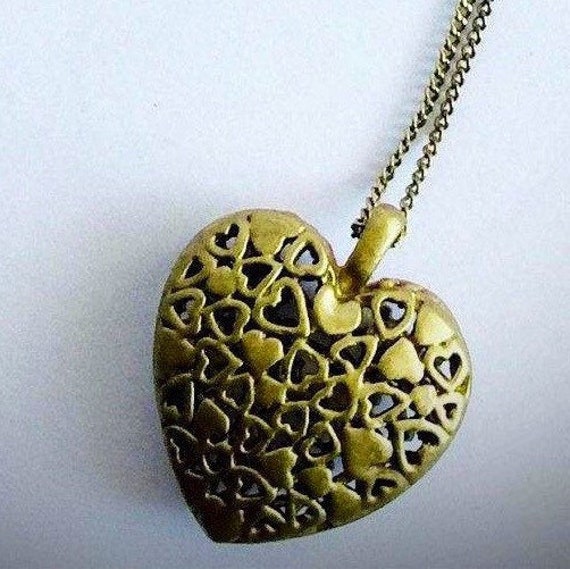 vintage open heart pendant with gold tone chain ne