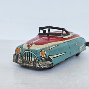 Tin Friction Toy
