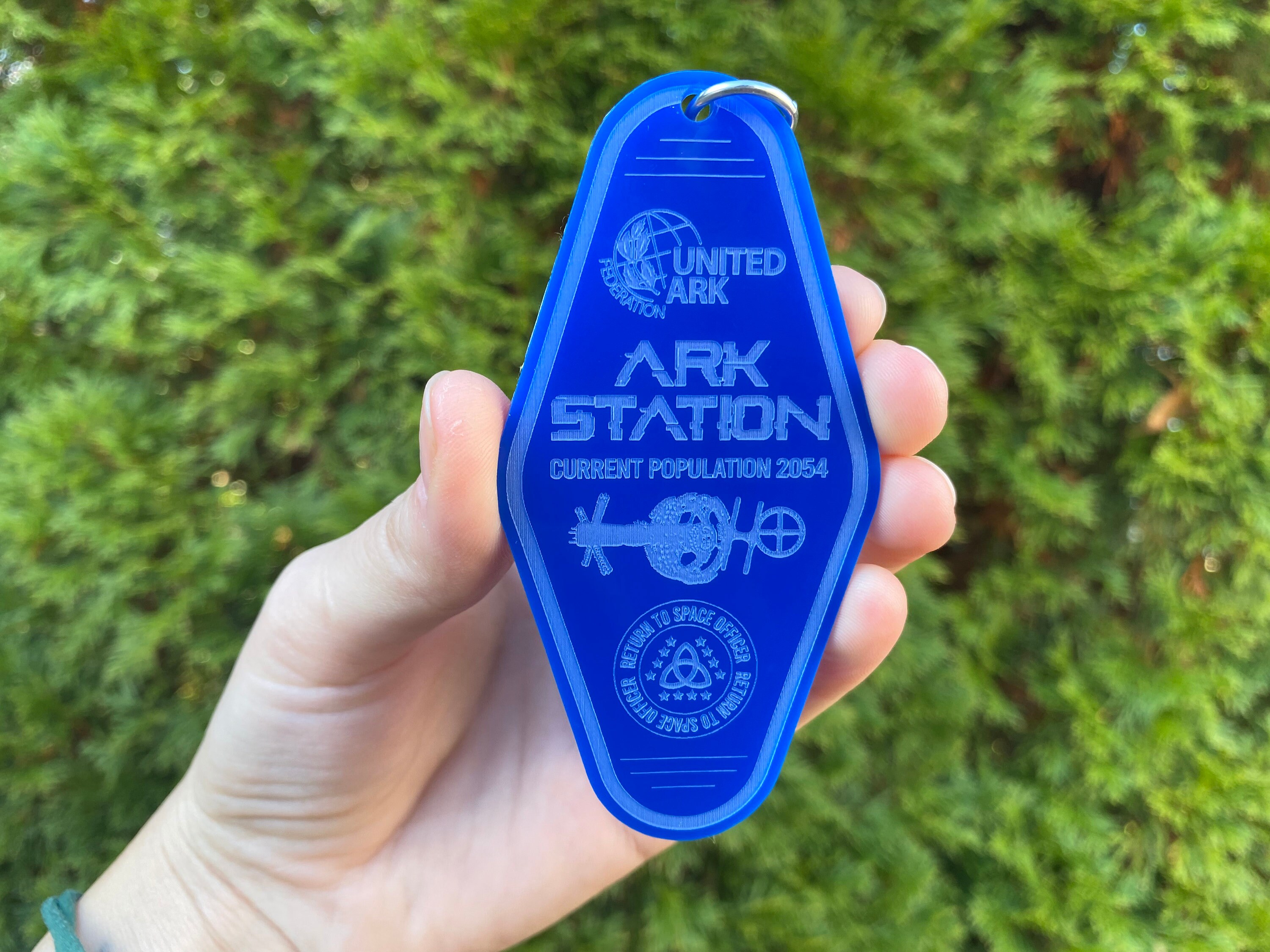 The 100 United Ark Station Keychain