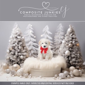 May include: A white puppy wearing a red bow sits on a white fur-covered stool in front of a winter wonderland backdrop. The backdrop features white trees with silver baubles and white lights.
