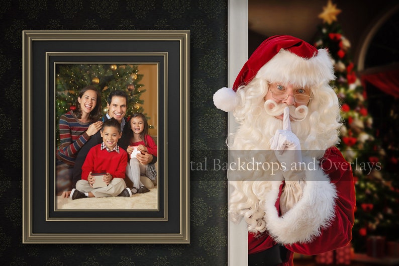May include: A framed photo of a family of four standing in front of a Christmas tree. Santa Claus is peeking around a corner with his finger to his lips, as if to say "shhh!"