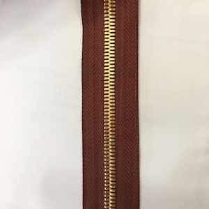 Golden brass corn teeth metal continuous zipper chain size #8, YKK color 331, redddish brown