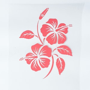 May include: A stencil of two pink hibiscus flowers with leaves and stems. The stencil is on a white background.