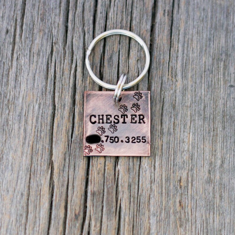 hand stamped antiqued copper square dog tag dog tags for dogs medium or large dog tag paw prints