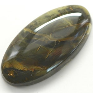 May include: A smooth, oval-shaped gemstone with a green, brown, and gold marbled pattern.