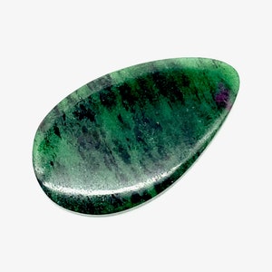 May include: A green and black teardrop-shaped gemstone cabochon.