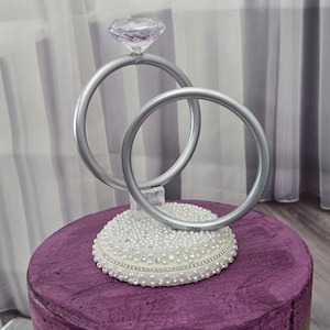 Silver and pearl Wedding Rings Cake Topper