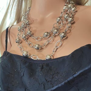 Vintage Silver Plated Beads & Chains Necklace with Three Rows.  Unsigned. In Fantastic Shape. The Necklace has 3 lengths 18&quot;, 20&quot;, and 24&quot;.