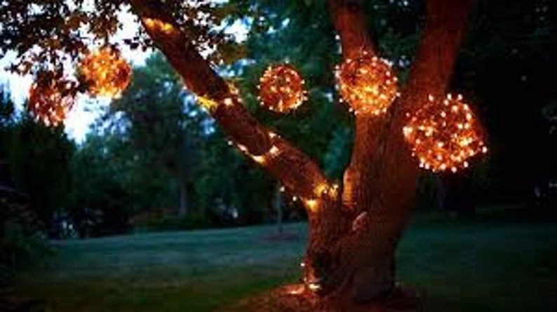20 Warm White Lights per Strand 100 total lights 5 strands on silver wire Solar-Powered Water fall lights No Can