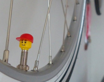 Bike valve caps made from LEGO® character parts; suitable on Presta / Sclaverandvalve & Dunlop 1x Set red