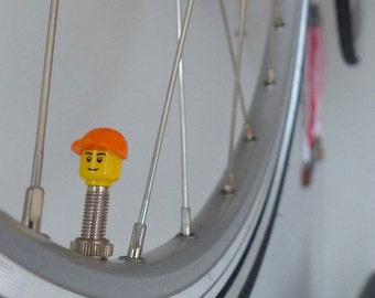 Bike valve caps made from LEGO® character parts; suitable on Presta / Sclaverandvalve & Dunlop 1x Set orange