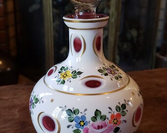 Antique BOHEMIAN CZECH VASE Cased cut to cranberry glass.White overlay.Hand Painted Roses with Gold trim Floral design.Cut top edges. Antique BOHEMIAN CZECH VASE Cased cut to cranberry glass.White overlay.Hand Painted Roses with Gold trim Floral design.Cut top edges.