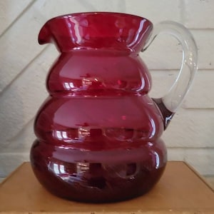 Vintage Cranberry Glass Pitcher Water Iced Tea Pitcher Ruby Glass Beehive shaped Pitcher with clear applied glass handle Christmas Pitcher